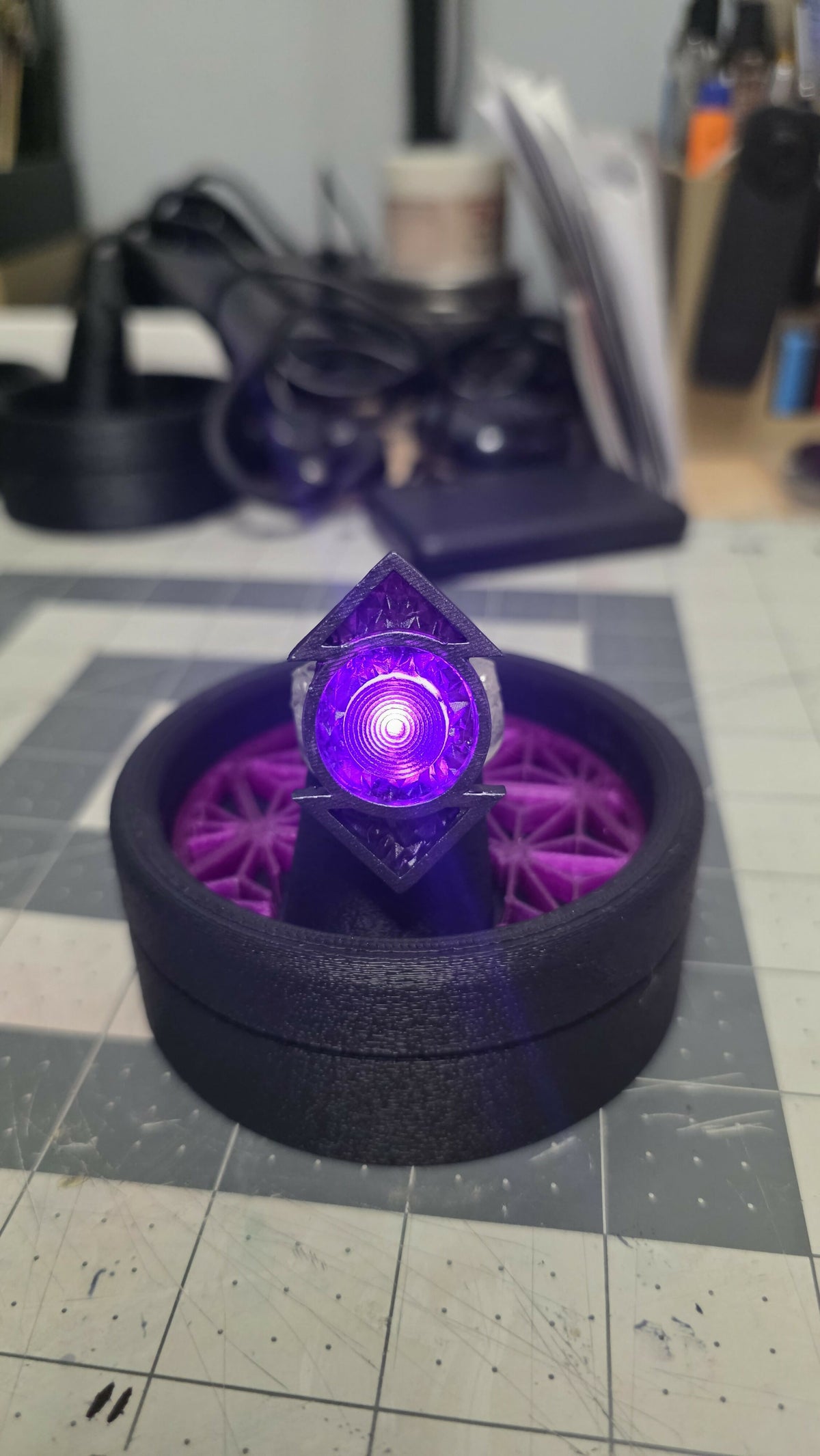 Indigo Lantern physical ring and display stand, product photo 4