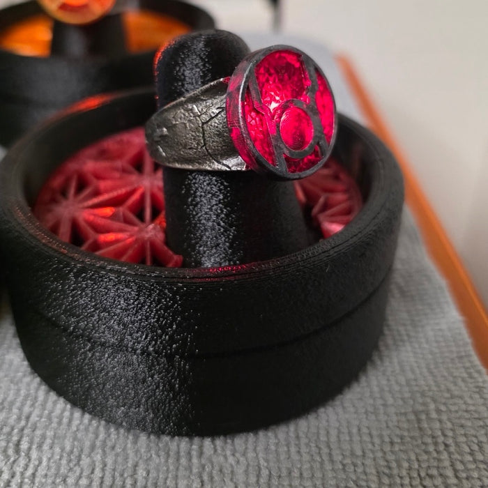 Red Lantern physical ring and display stand, square side-angle photograph